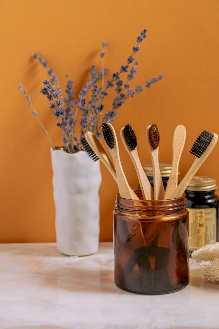 Wooden Toothbrushes in a Brown Glass Bottle